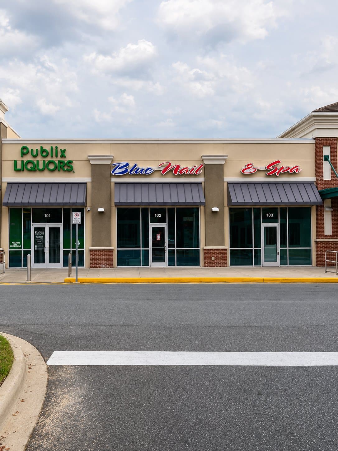 Blue Nails & Spa storefront next to Publix on Capital Circle NW, Tallahassee, FL 32303